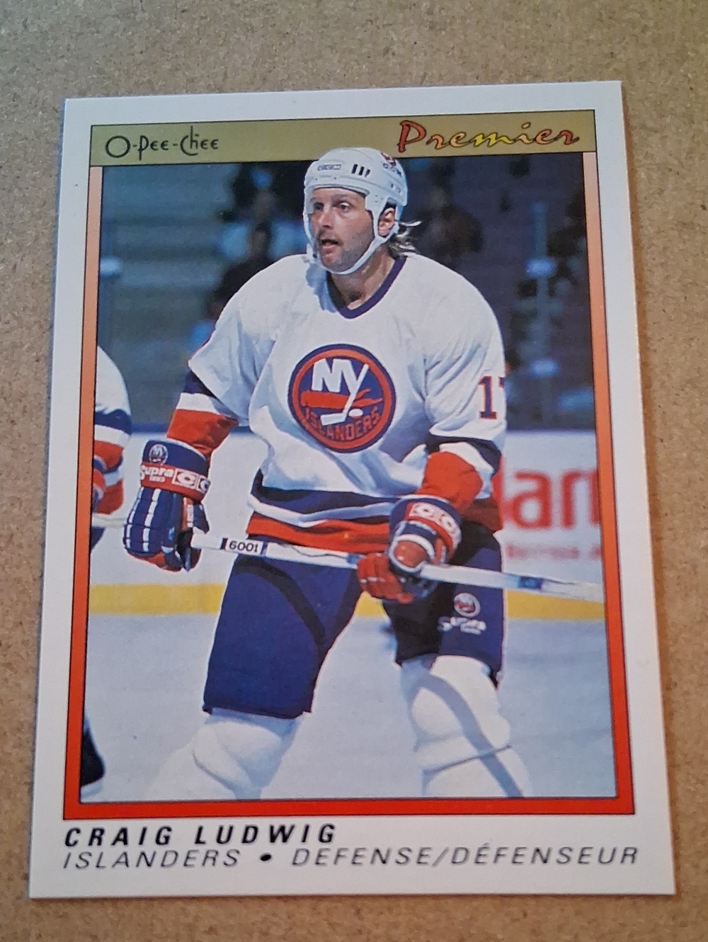 O-Pee-Chee Premier Craig Ludwig Islanders Hockey Card - White/Blue/Orange